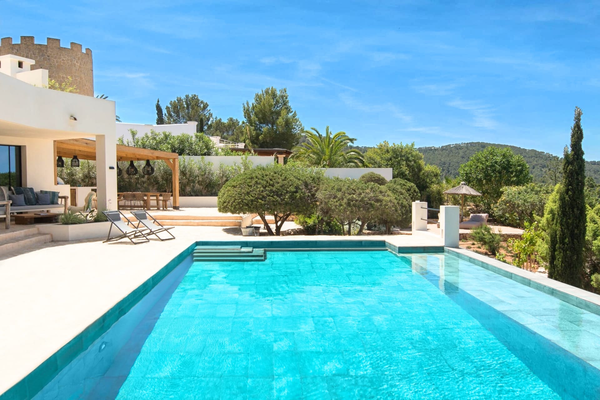 Stylish family Ibiza villa with striking sunset sea views